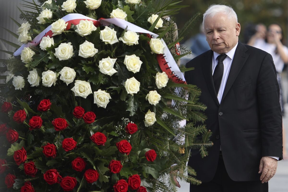 FILE - Poland's main ruling party leader Jaroslaw Kaczynski attends a wreath laying ceremony marking national observances of the anniversary of World War II in Warsaw, Poland, Sept. 1, 2022. Jaroslaw Kaczynski, leader of Polish nationalist conservative ruling party, Law and Justice, who has been touring Poland to drum up support ahead of next year's election, accused Germany during a meeting last weekend of seeking to dominate Europe, alleging that Berlin was using peaceful means to achieve aims that "it once wanted to implement using military methods." (AP Photo/Michal Dyjuk, File)
