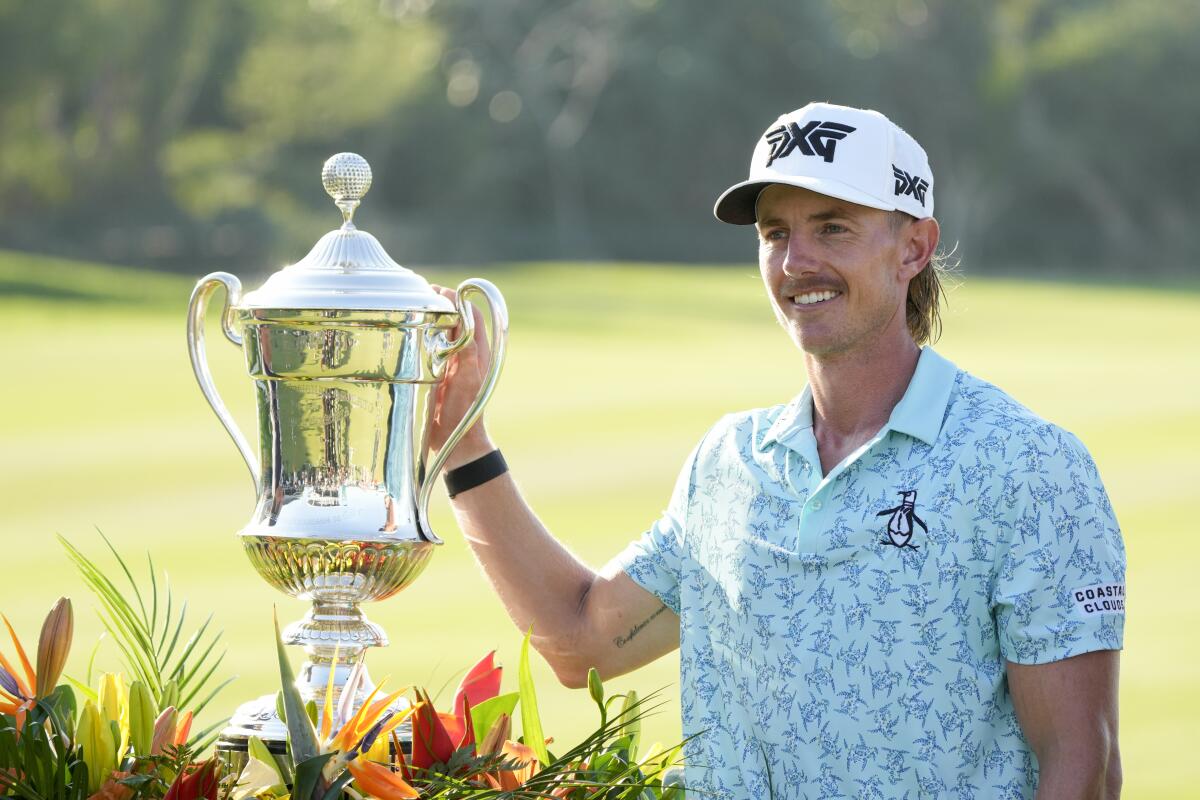 Jake Knapp poses with his trophy in Puerto Vallarta, Mexico on Sunday.