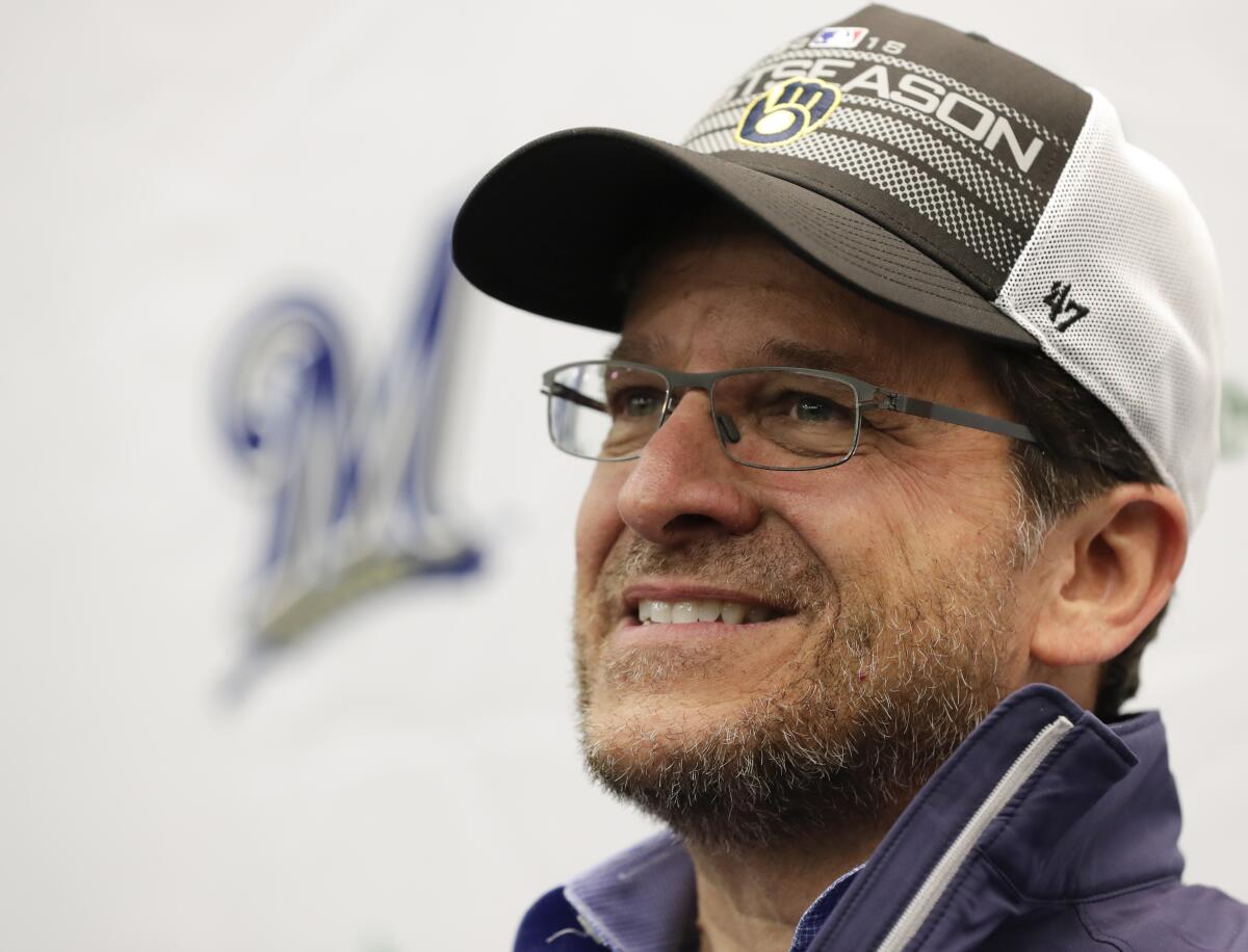 FILE - Milwaukee Brewers owner Mark Attanasio answers questions during a news conference before a baseball game between the Brewers and the Detroit Tigers Friday, Sept. 28, 2018, in Milwaukee. Attanasio is set to join the board of directors at Norwich, the English soccer club said Friday, Aug. 19, 2022. (AP Photo/Morry Gash, File)