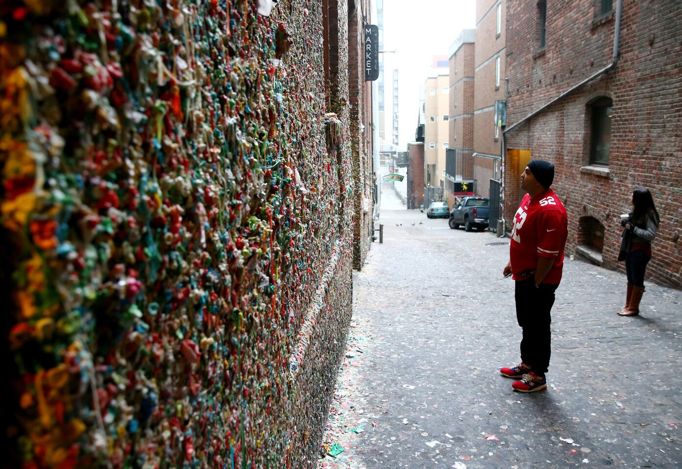 What do you do with your gum when it has lost its flavor? Do you stick it under the table (does anybody older than 7 really do that?) or spit it on the ground for an unsuspecting pedestrian to get stuck in the creases of his or her Nikes? For those who have no interest in throwing their Bubble Yum in the trash when it's run its course, here's another option: Add it to the ever-growing Gum Wall, a tourist attraction in Seattle.