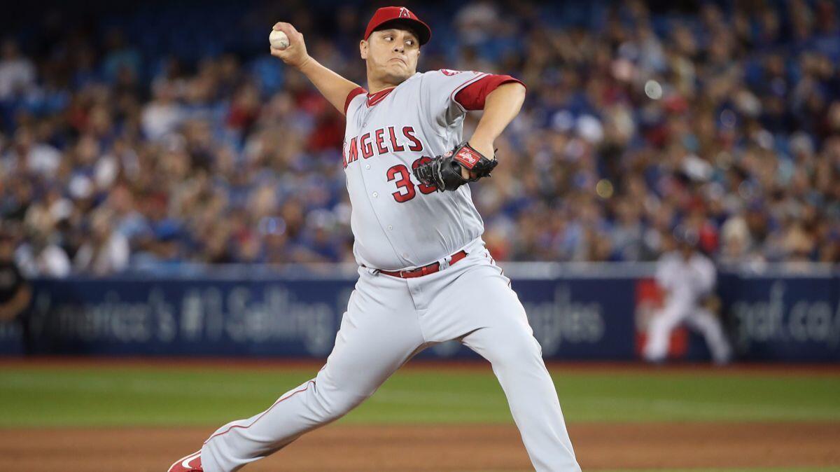 David Hernandez delivers a pitch in the eighth inning during a game betweeb the Angels and Toronto Blue Jays on Friday. The Angels traded Hernandez to the Arizona Diamondbacks on Monday.