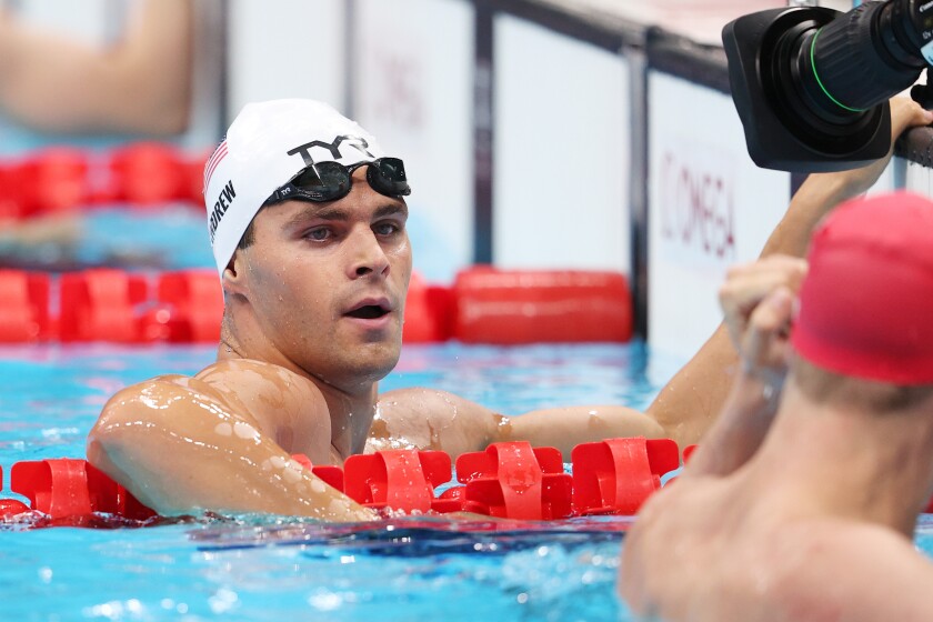 Michael Andrew competes in the preliminary heats of the 100 breaststroke at the Tokyo Olympics on Saturday.