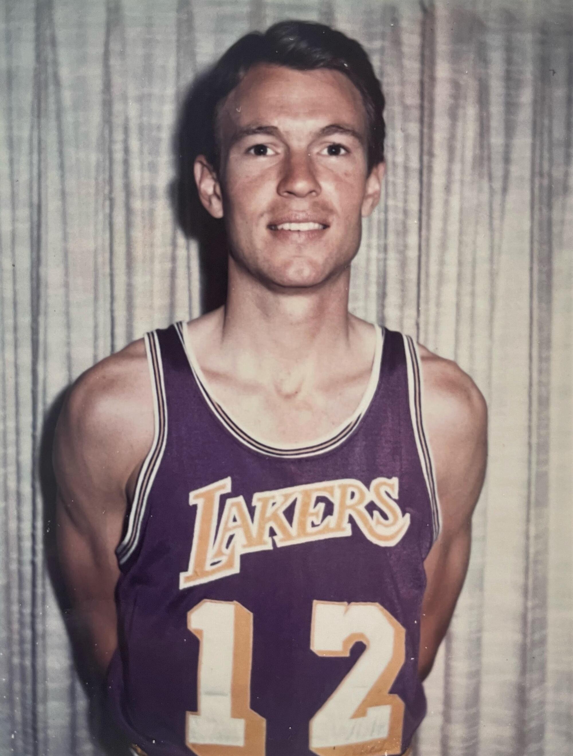 Bob Thate poses in a Lakers jersey after the team drafted him in 1970.