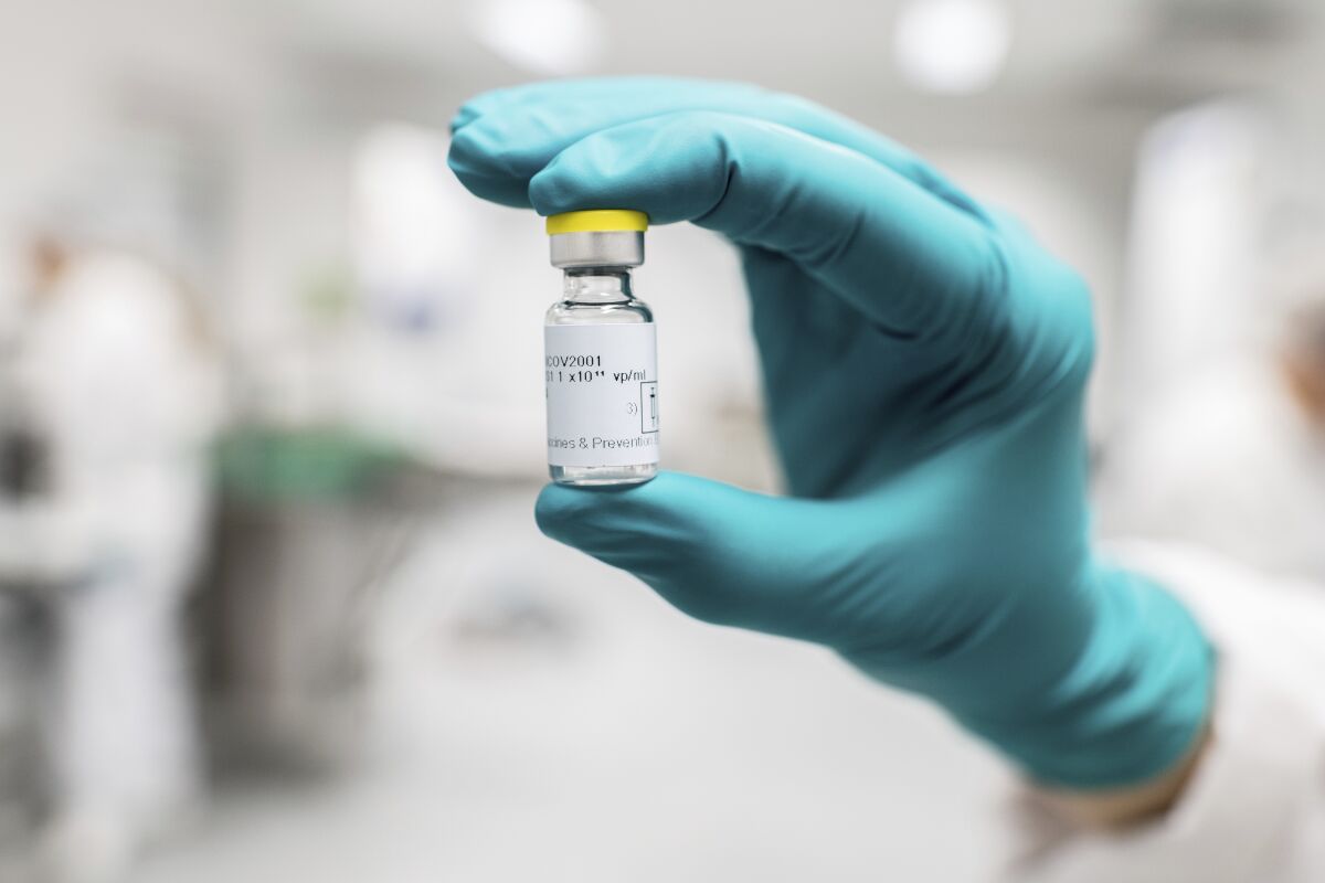 A vial of COVID-19 vaccine is shown.