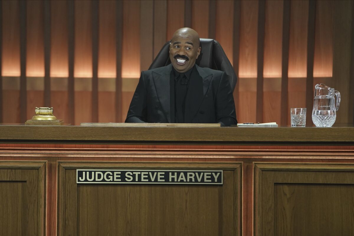 This image released by ABC shows Steve Harvey from "Judge Steve Harvey" in an episode entitled "Stuck on Stupid" airing Tuesday, Jan. 11 on ABC. (Danny Delgado/ABC via AP)