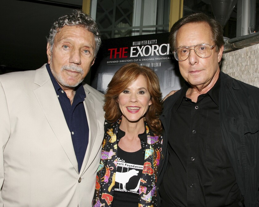 "The Exorcist" author William Peter Blatty, left, joins Linda Blair, who starred in the 1973 film, and William Friedkin, the film's director, at a screening in 2010.
