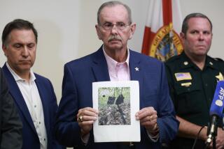 WEST PALM BEACH, FLORIDA - SEPTEMBER 15: Palm Beach County Sheriff Ric Bradshaw holds a photograph of the rifle and other items found near where a suspect was discovered during a press conference regarding an apparent assassination attempt of former President Donald Trump on September 15, 2024 in West Palm Beach, Florida. The FBI and U.S. Secret Service, along with the Palm Beach County Sheriff's office, are investigating the incident, which the FBI said "appears to be an attempted assassination of former President Trump' while he was golfing at Trump International Golf Club. (Photo by Joe Raedle/Getty Images)