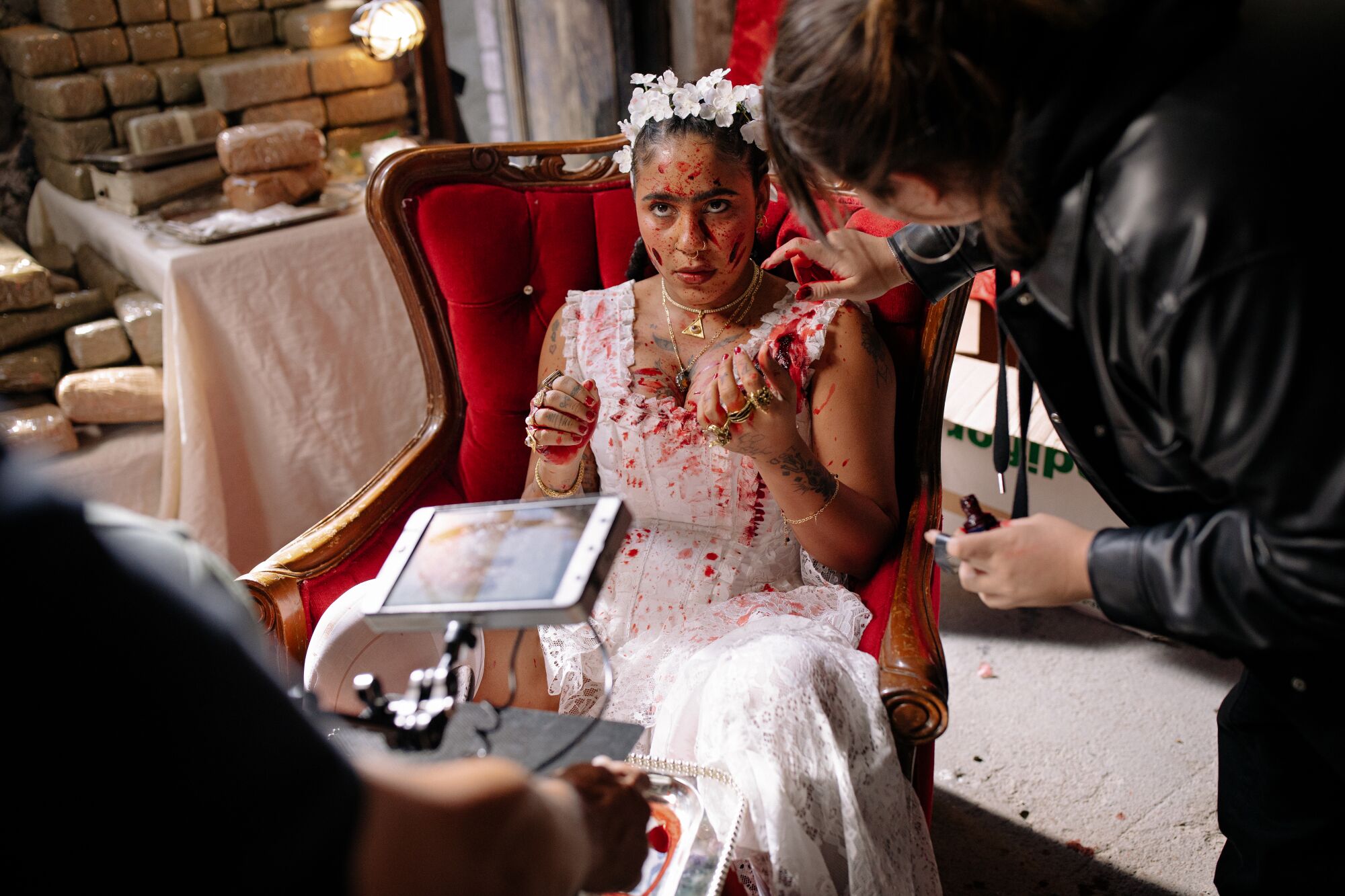 Tokischa's team prepares for a scene in her upcoming music video.