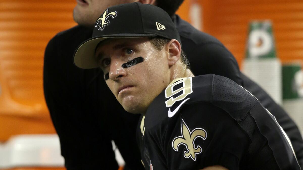 New Orleans Saints quarterback Drew Brees looks on during Sunday's loss to the Dallas Cowboys.