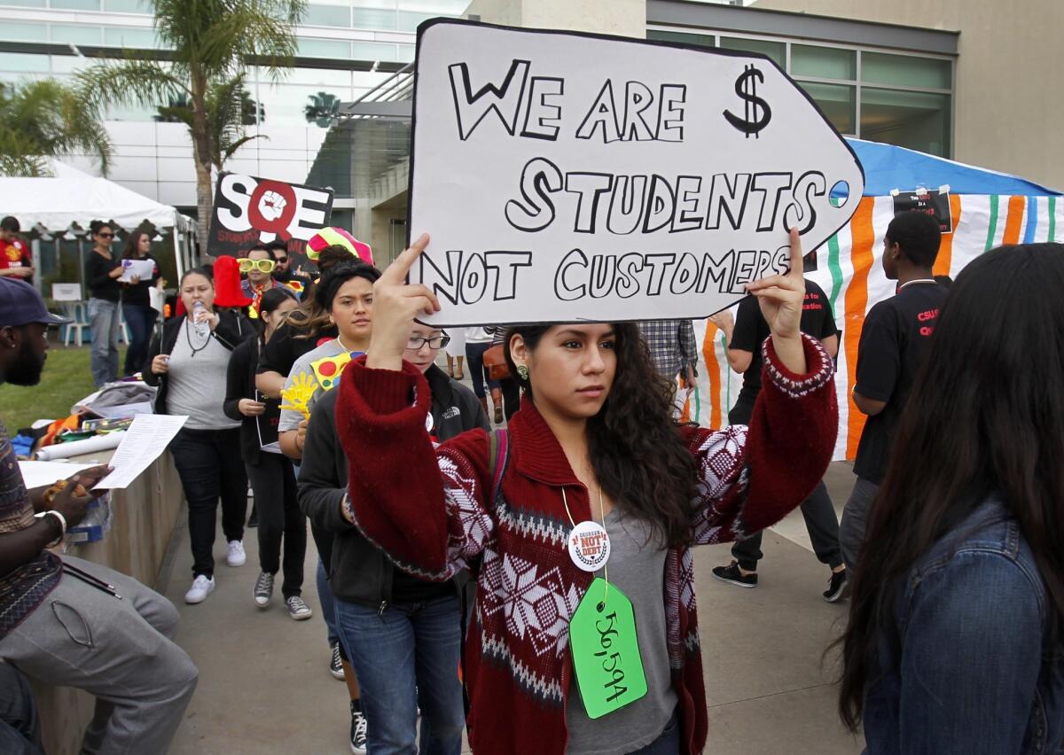 Cal State Northridge student Karen Gonzalez joins fellow CSU students demonstrating against so-called student success fees at a protest in November in Long Beach.