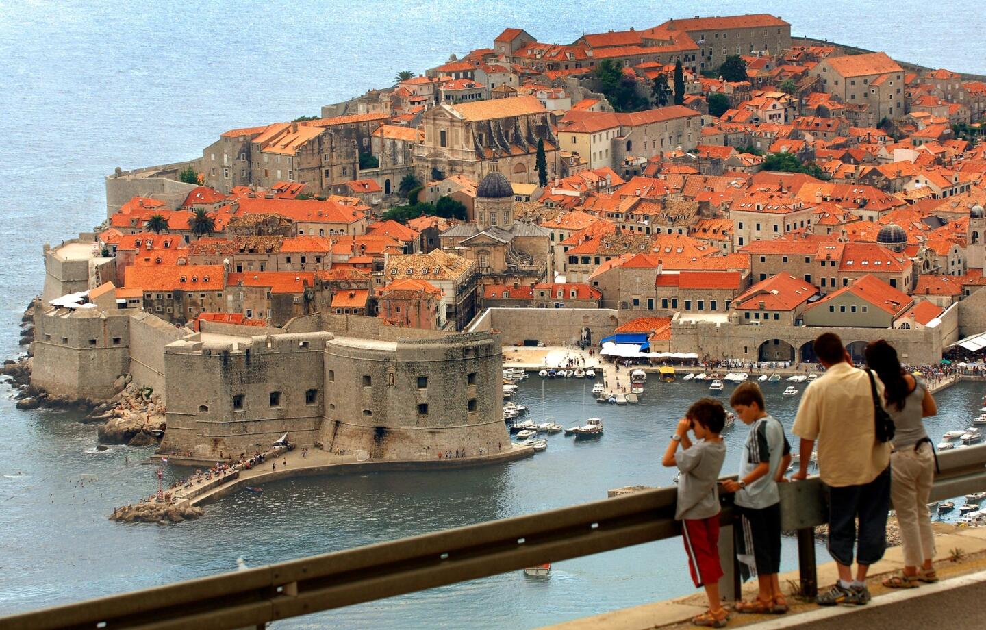 Dubrovnik's Old City, with its red-tiled roofs set against the azure Adriatic, is a UNESCO World Heritage Site.