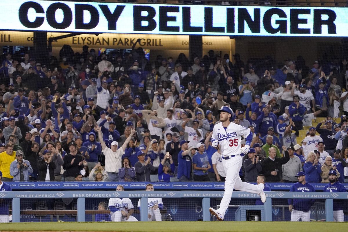 Cody Bellinger heads home after a solo home run Monday.