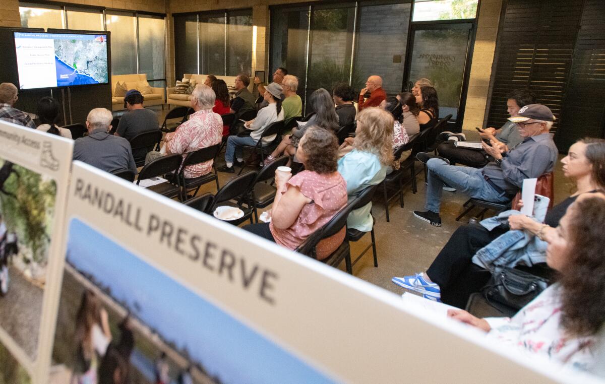 Members of coastal Orange County communities attend an open house Tuesday.