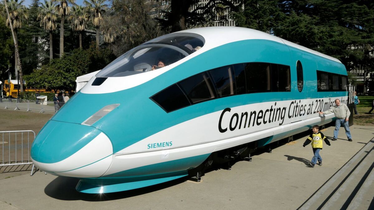 California's high-speed rail project, which would send bullet trains through the east San Fernando Valley, has been controversial in Council District 7. Above, a full-size mockup of a bullet train. (Rich Pedroncelli / Associated Press)