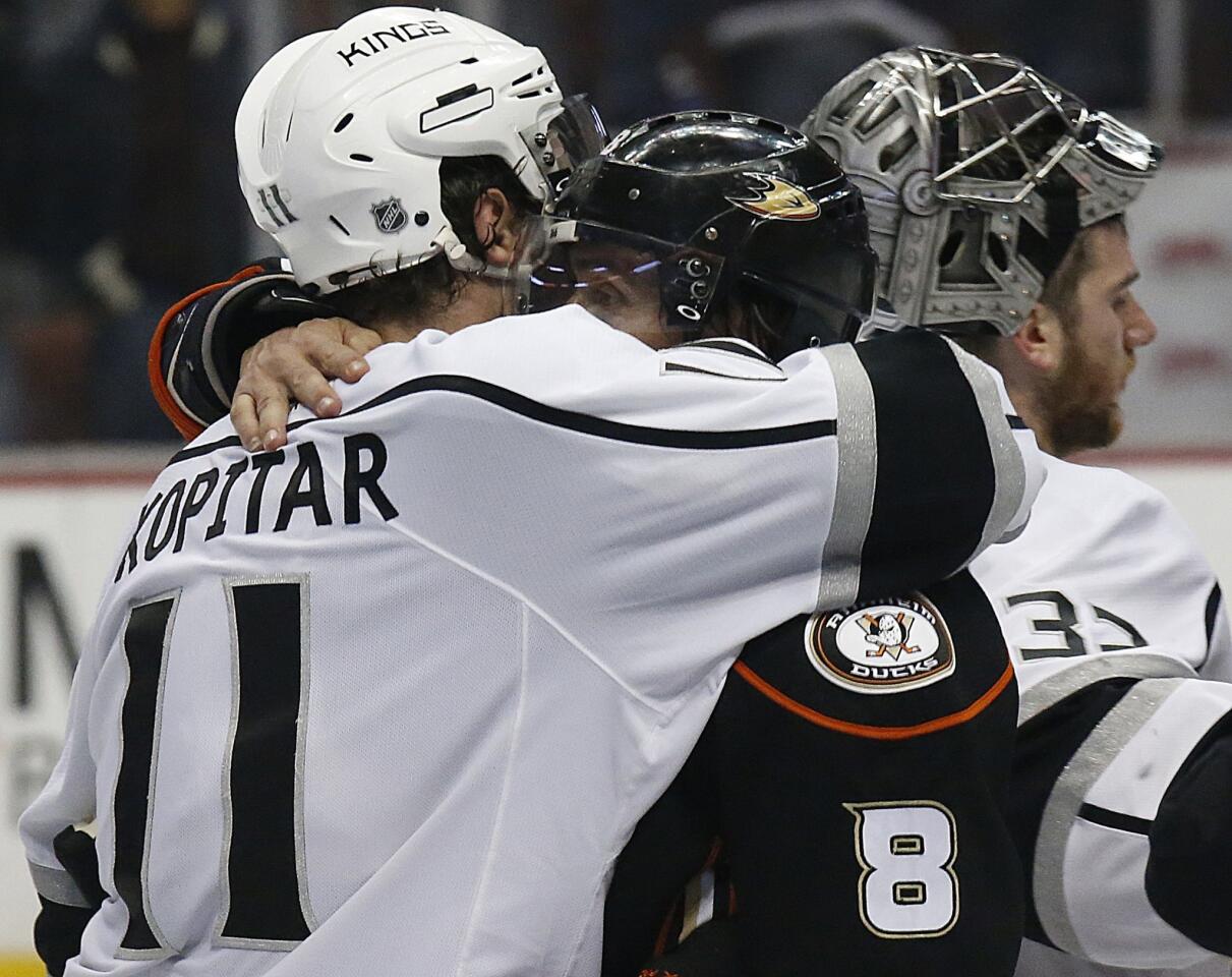 Kings center Anze Kopitar embraces Ducks right wing Teemu Selanne, who played his final NHL game in a 6-2 loss on Friday night at Honda Center in Anaheim. Selanne is retiring at age 43 after 23 seasons.