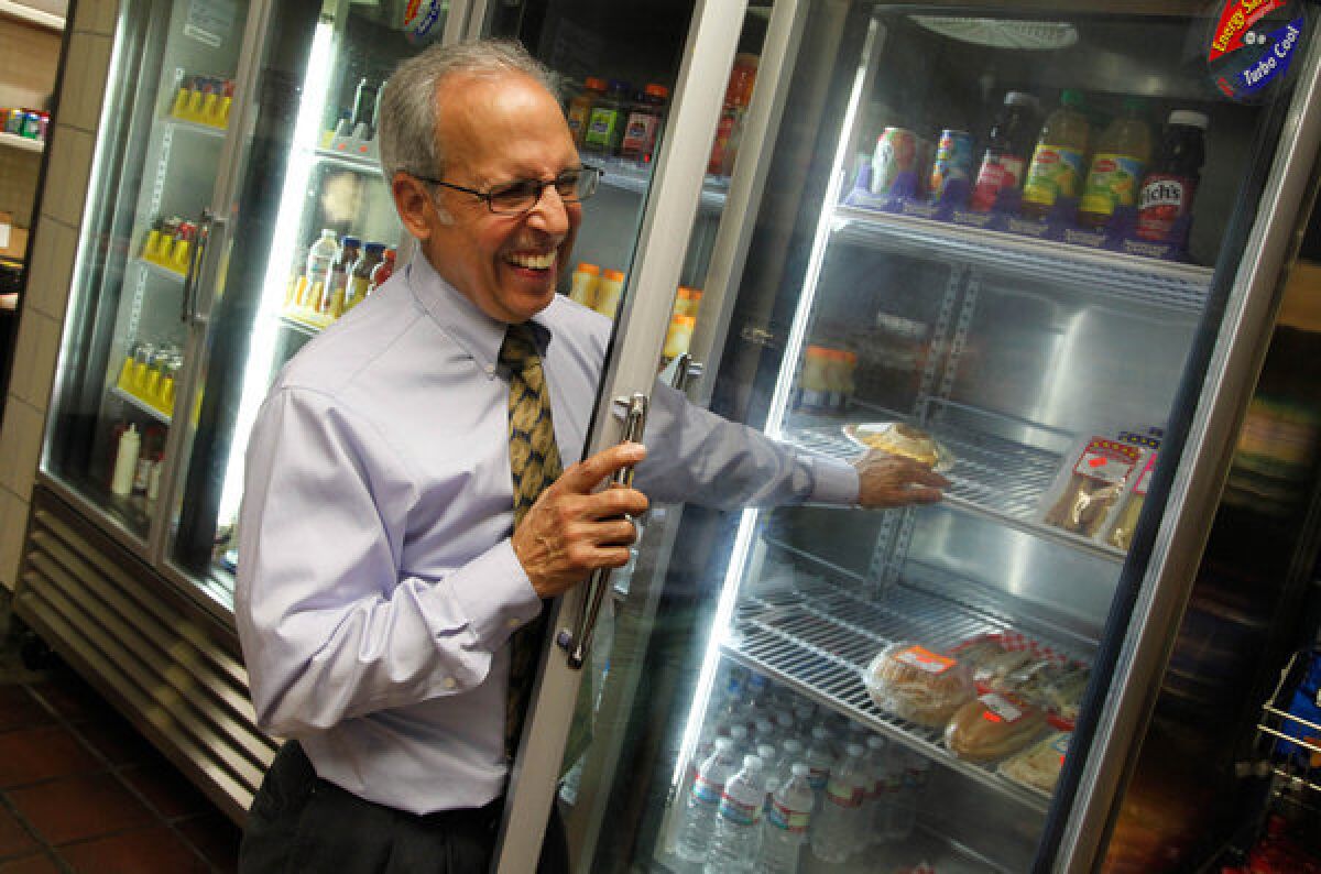 Lopez's new shop at the Downey courthouse is tucked into a windowless corner on the first floor where he can hear the constant beep of the security screeners. He is still getting the hang of the register, and the ice machine and freezer are in need of repair. Business is slower, but he's convinced his store will thrive.
