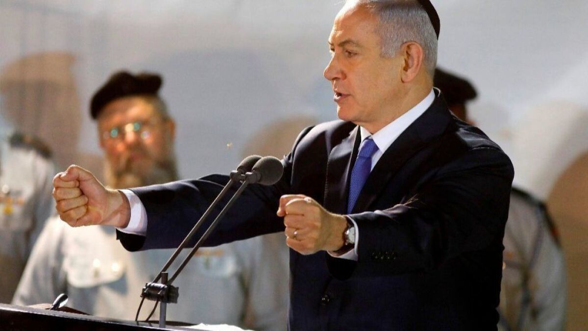 Prime Minister Benjamin Netanyahu attends the funeral of Israeli soldier Zachary Baumel on April 4 in Jerusalem. Baumel went missing in 1982, and his remains were recently repatriated.