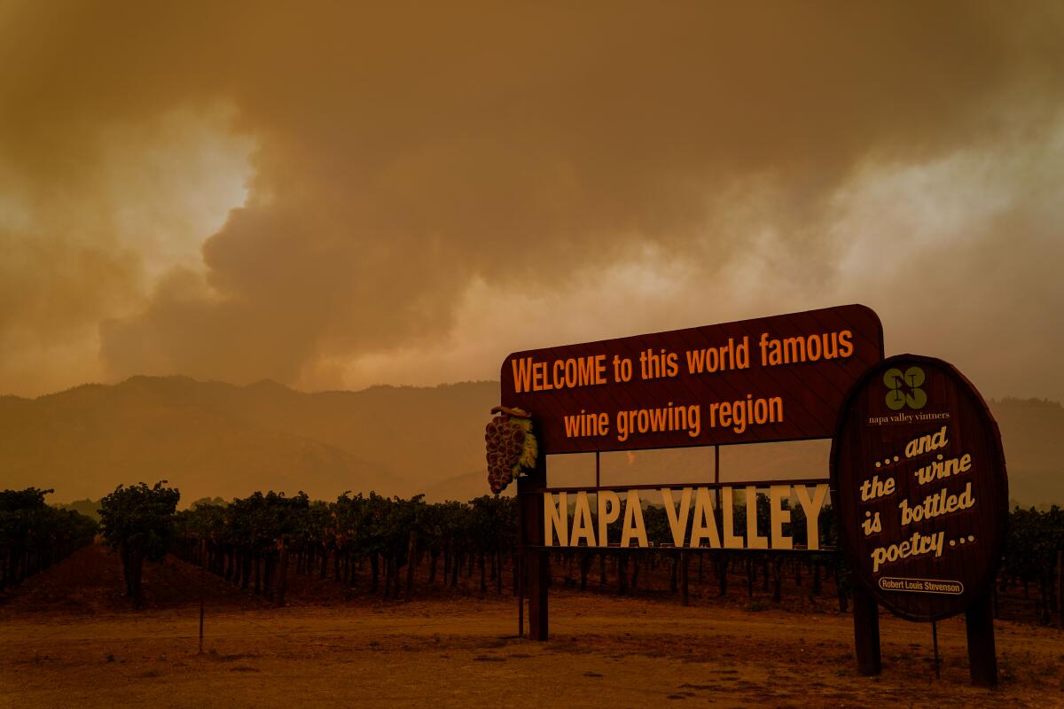 Smoke from the Glass fire is visible from along Highway 128 in Calistoga on Wednesday.