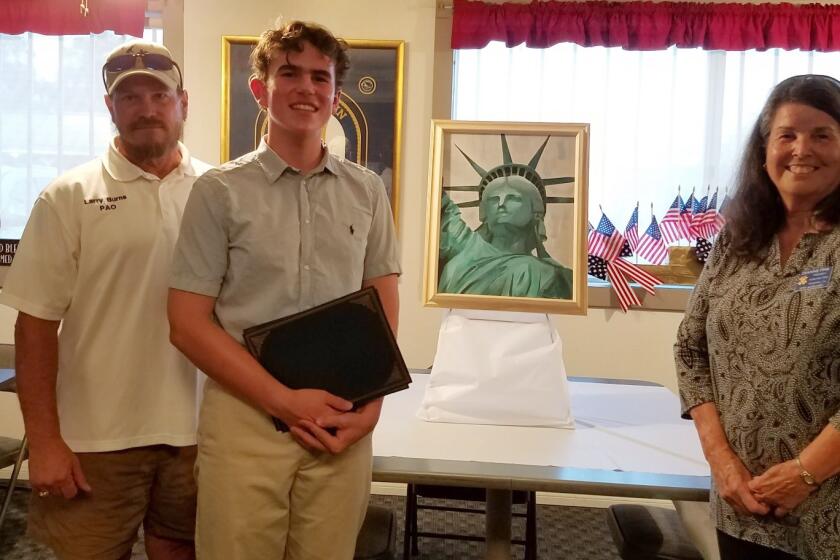 L to R, VFW Post Commander Larry Burns, 2021 art contest winner Daniel Gemmingen, and VFW Auxiliary President Dianne Fink.