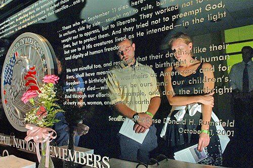 REFLECTING: Al Gambacorta and his wife, Pam, of Buffalo, N.Y., take in a memorial at the Pentagon to those killed in the Sept. 11 attack there. Pentagon officials say they cant keep accurate track of terrorist recruiting trends, especially as Al Qaeda has evolved.