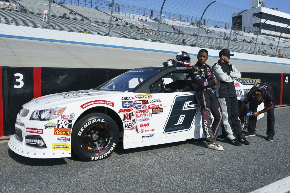 Rajah Caruth waits for the start of an ARCA Series race at Dover International Speedway in May 2021.