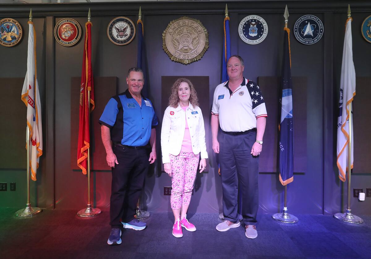 Squadron 291 Cmdr. Tim Sullivan, President Mary Beth Martin, and Cmdr.  of Post 291 Evin Planto.