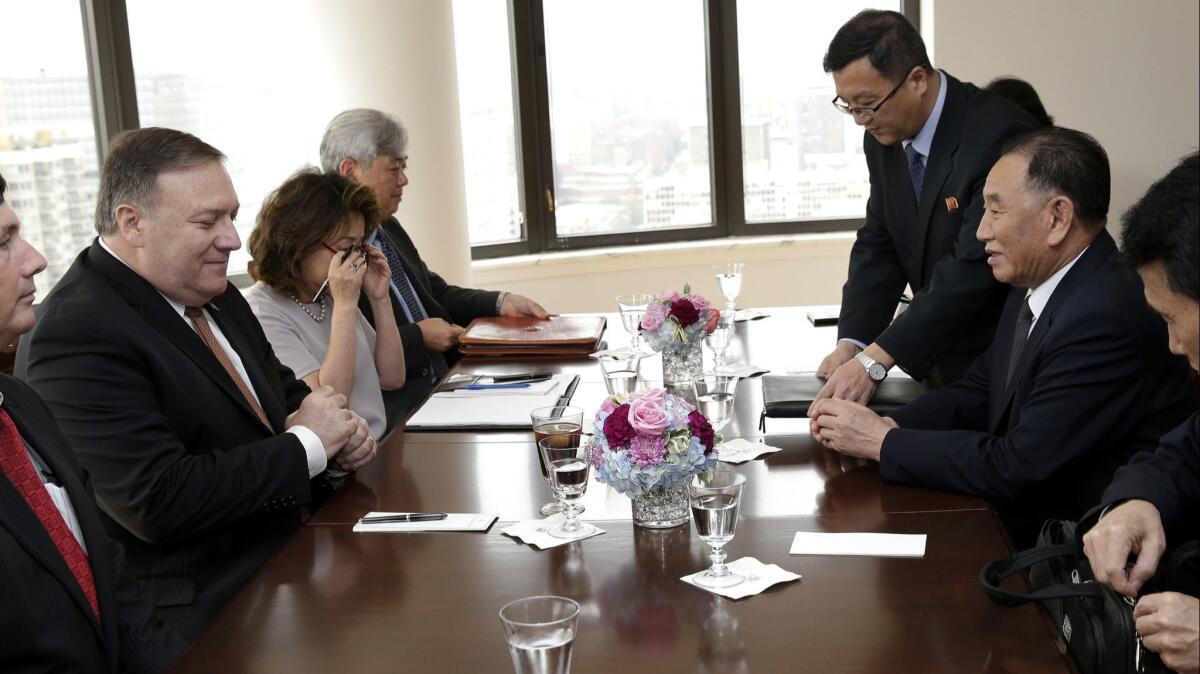 Kim Yong Chol, right, former North Korean military intelligence chief and one of leader Kim Jong Un's closest aides, sits across from U.S. Secretary of State Mike Pompeo during a meeting on May 31 in New York.