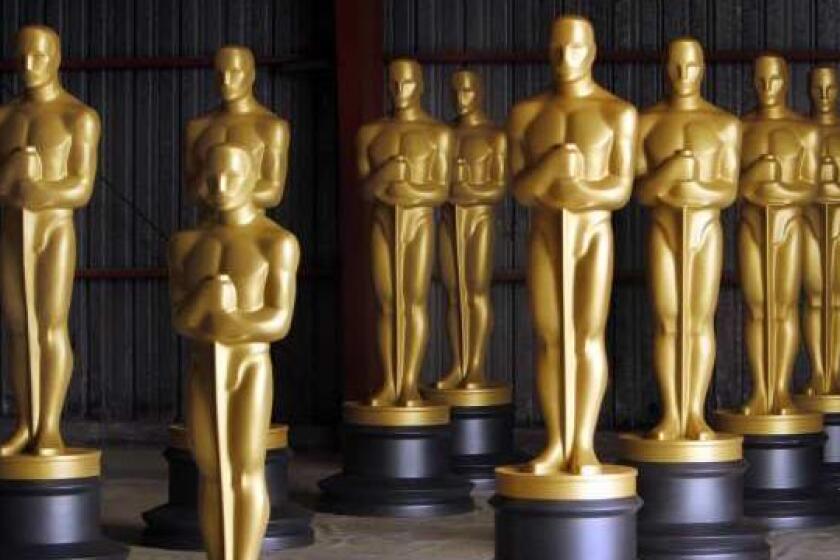 LOS ANGELES, CA - OCTOBER 19, 2009: Newly painted Oscar Statues dry after getting a fresh coat Monday morning at a undisclosed Los Angeles County location in preparation for the Governors Awards and the 82nd Academy Awards. All the Oscar statues get a new coat of paint that will have more shine this year with a darker base that more closely resembles the statuette. The scenic artists are using a low VOC paint this year that has no metal and is more California compliant. The Academy will present the Irving G. Thalberg Memorial Award to producer-executive John Calley, and Honorary Awards to actress Lauren Bacall, producer-director Roger Corman, and cinematographer Gordon Willis. All four awards will be presented at the Academy's inaugural Governors Awards event on Saturday, November 14, at the Grand Ballroom at Hollywood & Highland Center. The Academy Awards for outstanding film achievements of 2009 will be presented on Sunday, March 7, 2010. (Al Seib / Los Angeles Times)