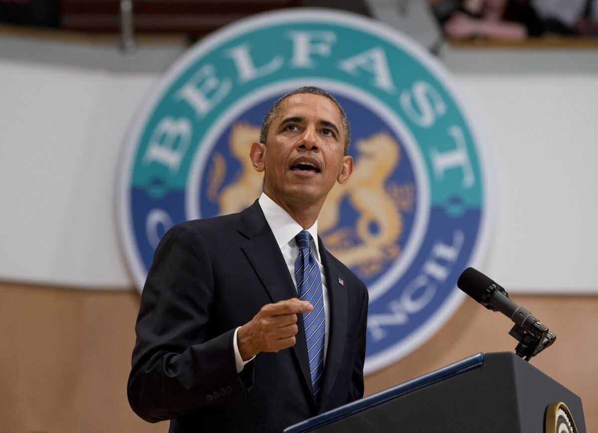 President Obama gestures during a speech at Belfast Waterfront Hall in Northern Ireland.