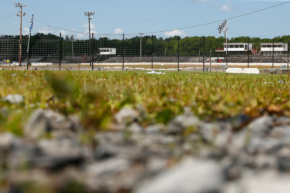 The grandstands sit empty at the Canandaigua Motorsports Park on Sunday.