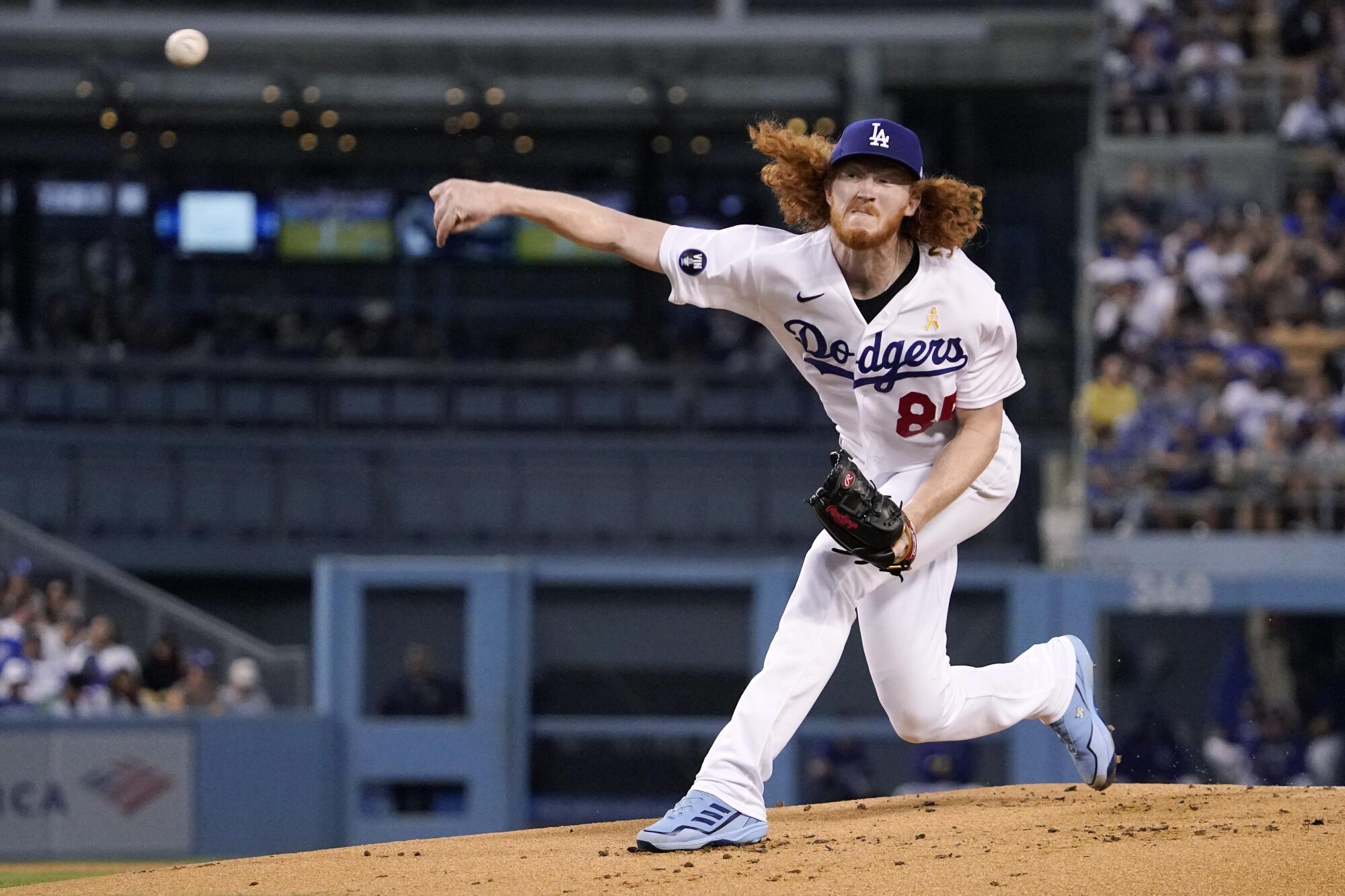 Dodgers pitcher Dustin May delivers against the San Diego Padres.