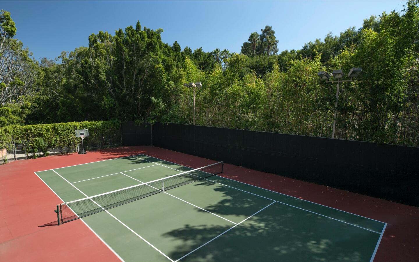 The tennis court.