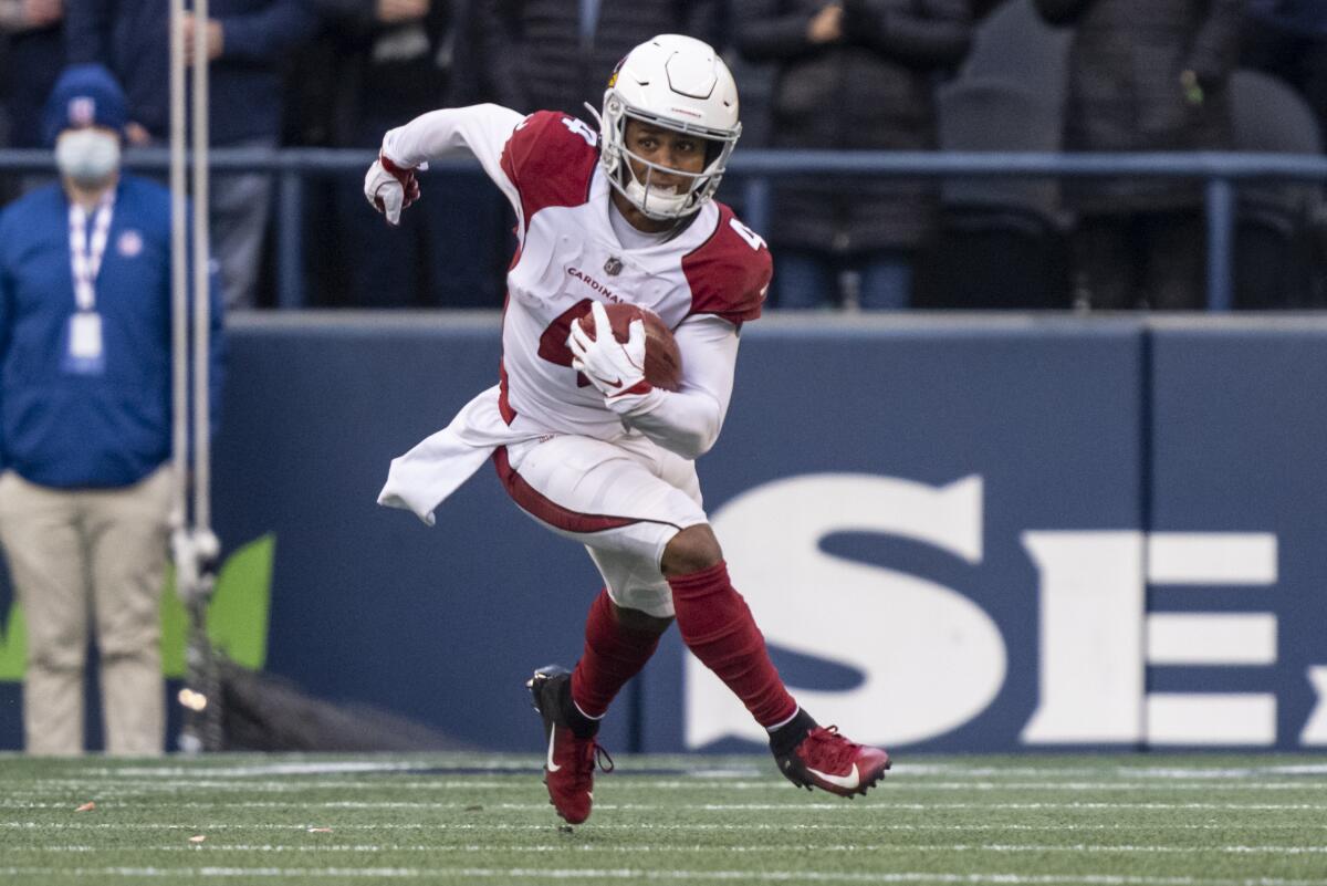 Arizona Cardinals wide receiver Rondale Moore runs with the ball against the Seattle Seahawks.