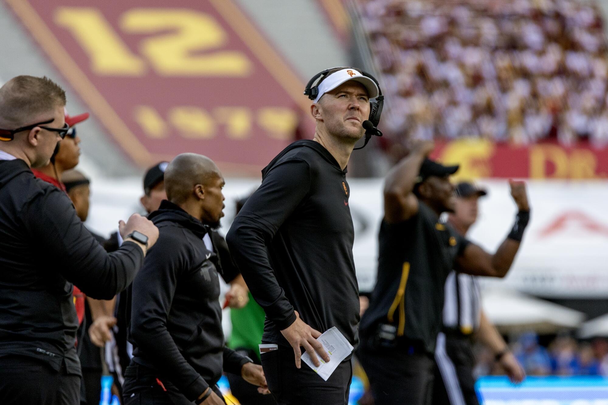 USC coach Lincoln Riley watches the replay board during the team's 38-20 loss to UCLA 