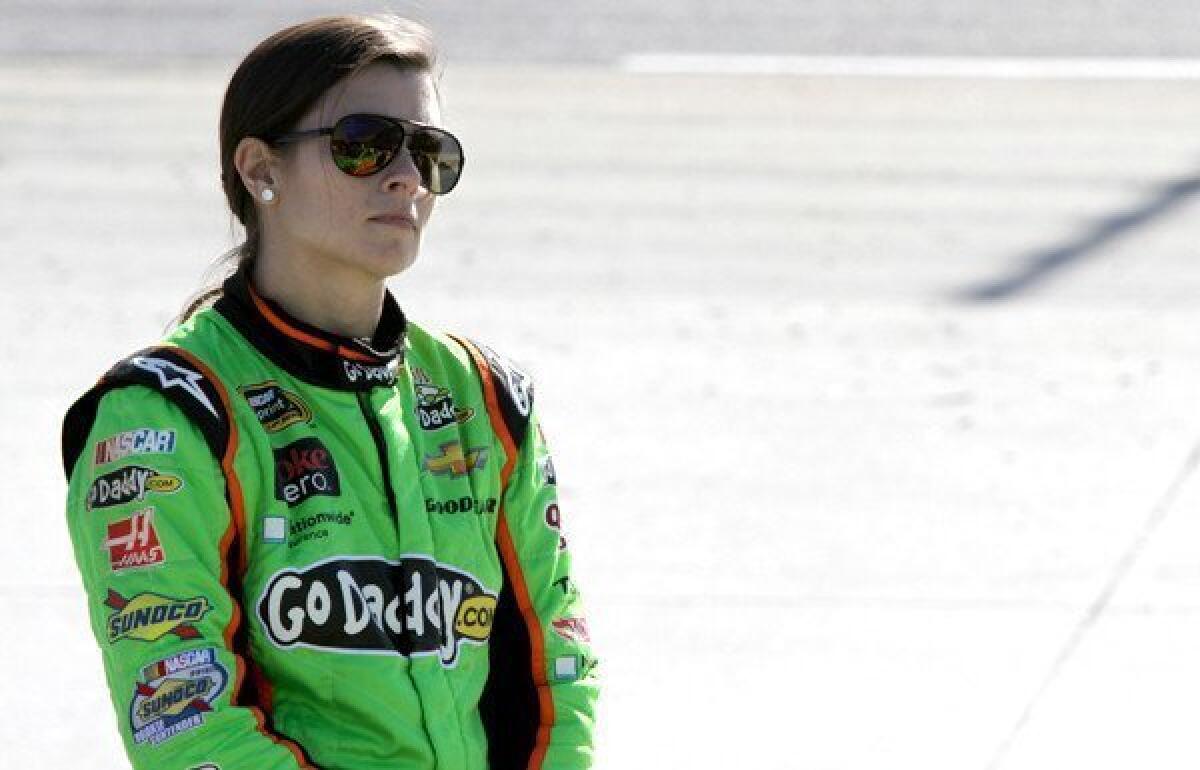 NASCAR driver Danica Patrick in her more traditional track garb during qualifying for the Sprint Cup Series race last week at Martinsville Speedway in Virginia.