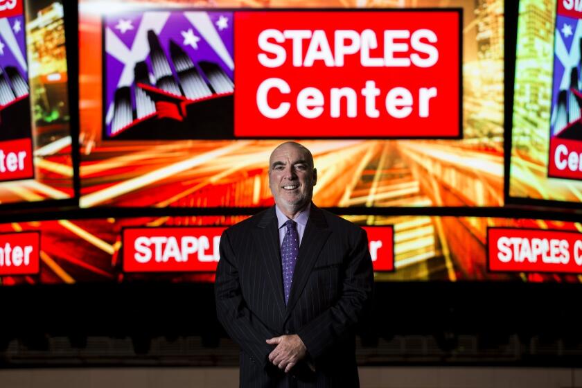 Lee Zeidman, president of Staples Center, Nokia Theatre and L.A. Live, stands in front of the scoreboard on the floor of the arena.