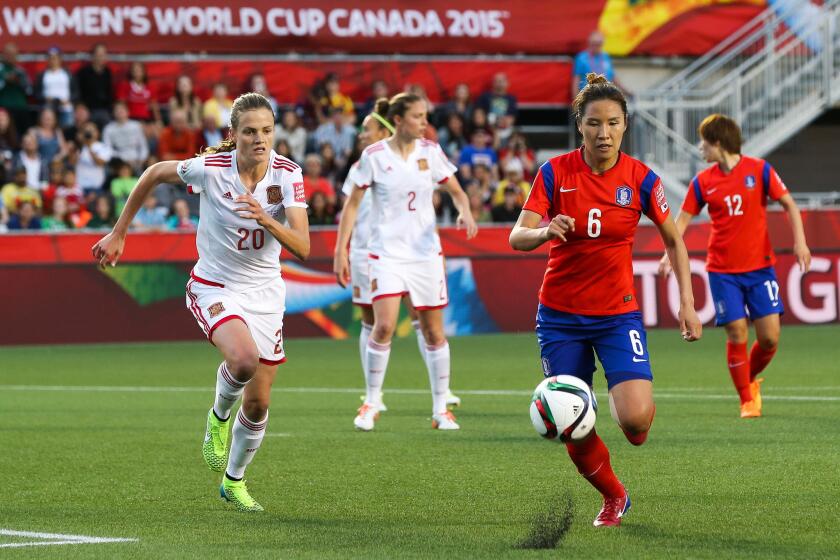 The South Korean and Spanish soccer teams face off in a FIFA Women's World Cup game in Ottawa, Canada, on June 17.