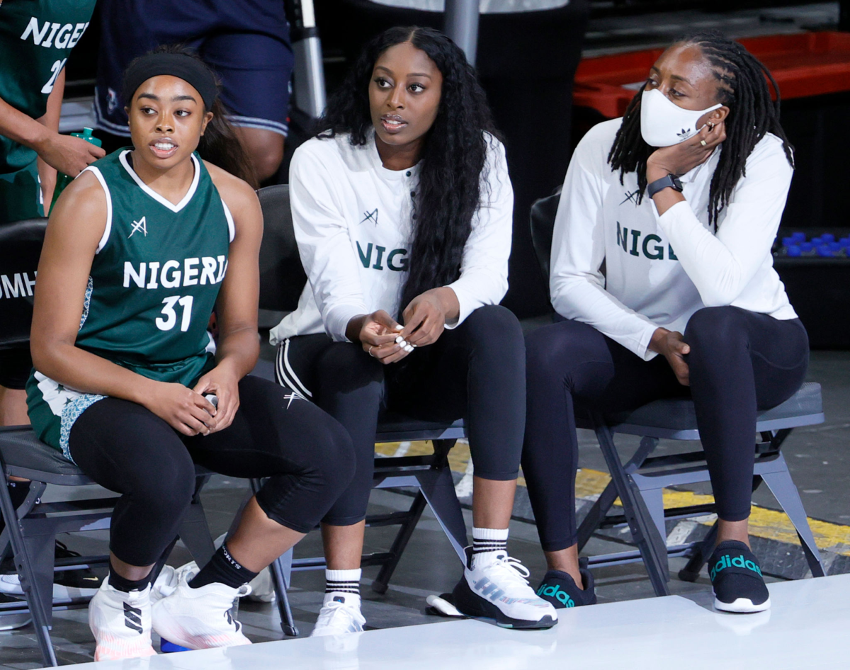 Sisters, from left, Erica Ogwumike, Chiney Ogwumike and Nneka Ogwumike look on during a Nigeria exhibition game.