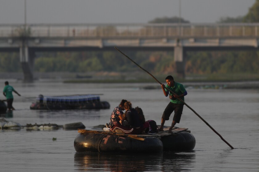 Guatemalans crossing the Suchiate River