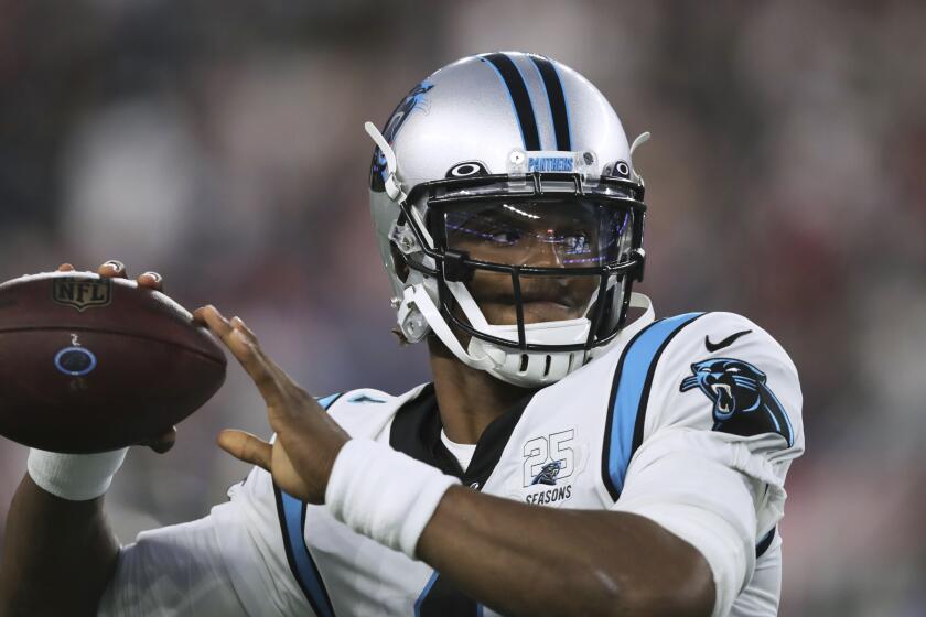 Carolina Panthers quarterback Cam Newton warms up before an NFL preseason football game against the New England Patriots, Thursday, Aug. 22, 2019, in Foxborough, Mass. (AP Photo/Charles Krupa)