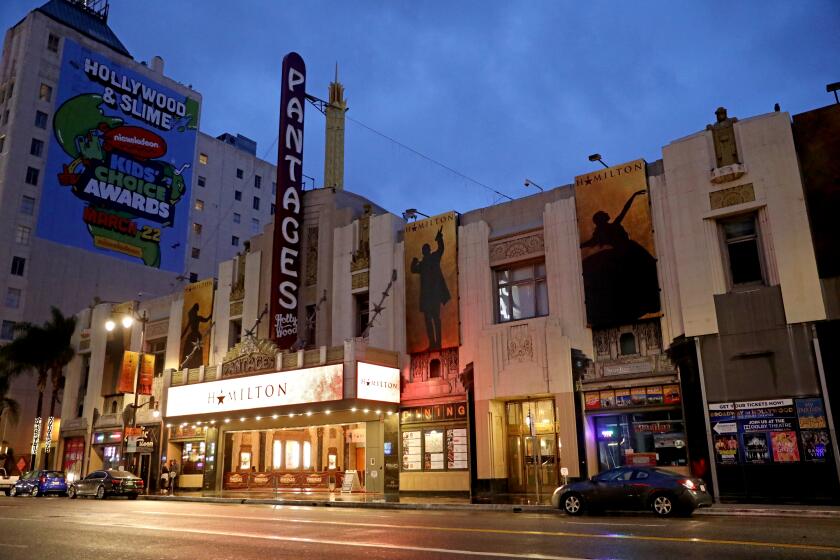 LOS ANGELES, CALIF. -- THURSDAY, MARCH 12, 2020: Pantages Theatre at 6233 Hollywood Blvd in Los Angeles, Calif., on March 12, 2020. Pantages suspends performances of 'Hamilton' from Thursday, March 12th through Tuesday, March 31st due to concerns of coronavirus. (Gary Coronado / Los Angeles Times)