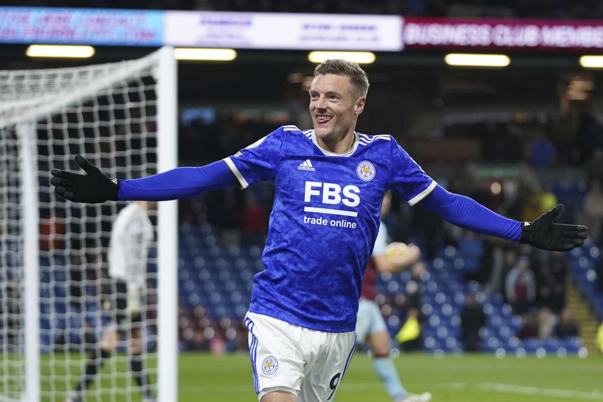 Leicester's Jamie Vardy celeb rates after scoring his sides second goal of the game during the English Premier League soccer match between Burnley and Leicester City at Turf Moor stadium in Burnley, England Tuesday,March 1, 2022. (AP Photo/Jon Super)