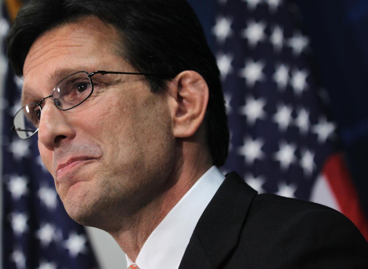 Rep. Eric Cantor (R-Va.) pauses as he speaks during a news conference announcing that he will step down as House majority leader.