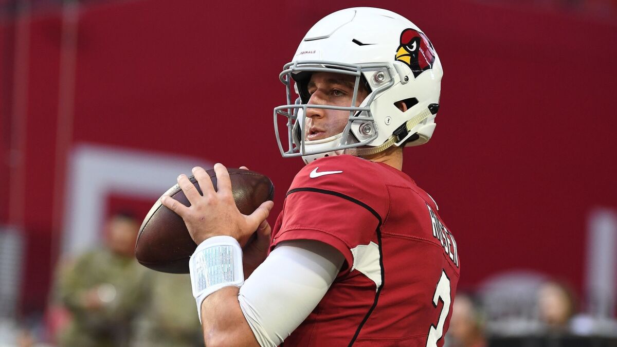 Josh Rosen of the Arizona Cardinals warms up for before a game against the Oakland Raiders.