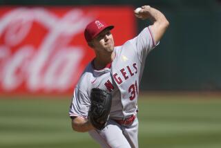Los Angeles Angels pitcher Tyler Anderson works against the Oakland Athletics.