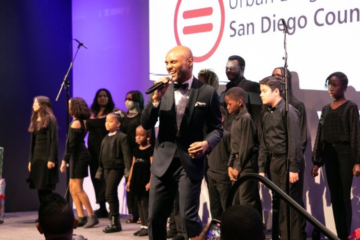 R&B singer Kenny Lattimore performs at the Diversity Awards with the San Diego Young Artist Music Academy.
