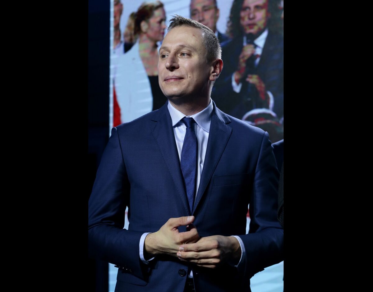 FILE - Polish Senator Krzysztof Brejza in Warsaw, on the night of parliamentary elections, Oct. 13, 2019. Amnesty International said Thursday Jan. 6, 2022, that its has independently confirmed that powerful spyware from the Israeli surveillance software maker NSO Group was used to hack Polish senator, Krzysztof Brejza, multiple times in 2019 when he was running the opposition’s election campaign to unseat the right-wing government. The senator, Krzysztof Brejza, and two other government critics, Roman Giertych and Ewa Wrzosek, were hacked with NSO’s Pegasus spyware. (AP Photo)