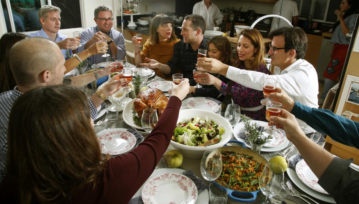 Friends and family gather for chef Adam Perry Lang's Thanksgiving feast.