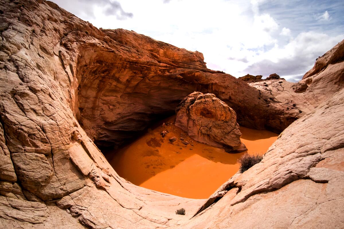 A bowl-like formation in reddish sandstone