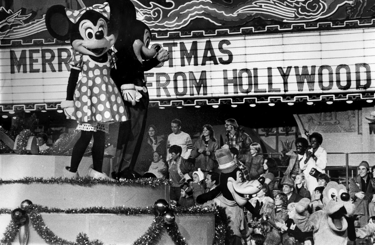 Nov. 26, 1978: Mickey and Minnie Mouse proved big hits as 300,000 viewed the Hollywood Christmas Parade.